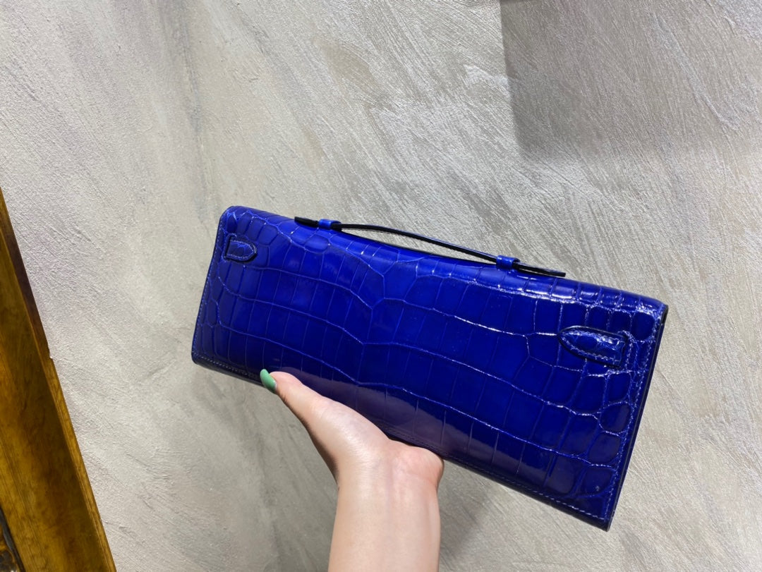 KELLY CUT 31 IN ADMIRAL BLUE SHINNY ALLIGATOR LEATHER WITH SILVER HARDWARE