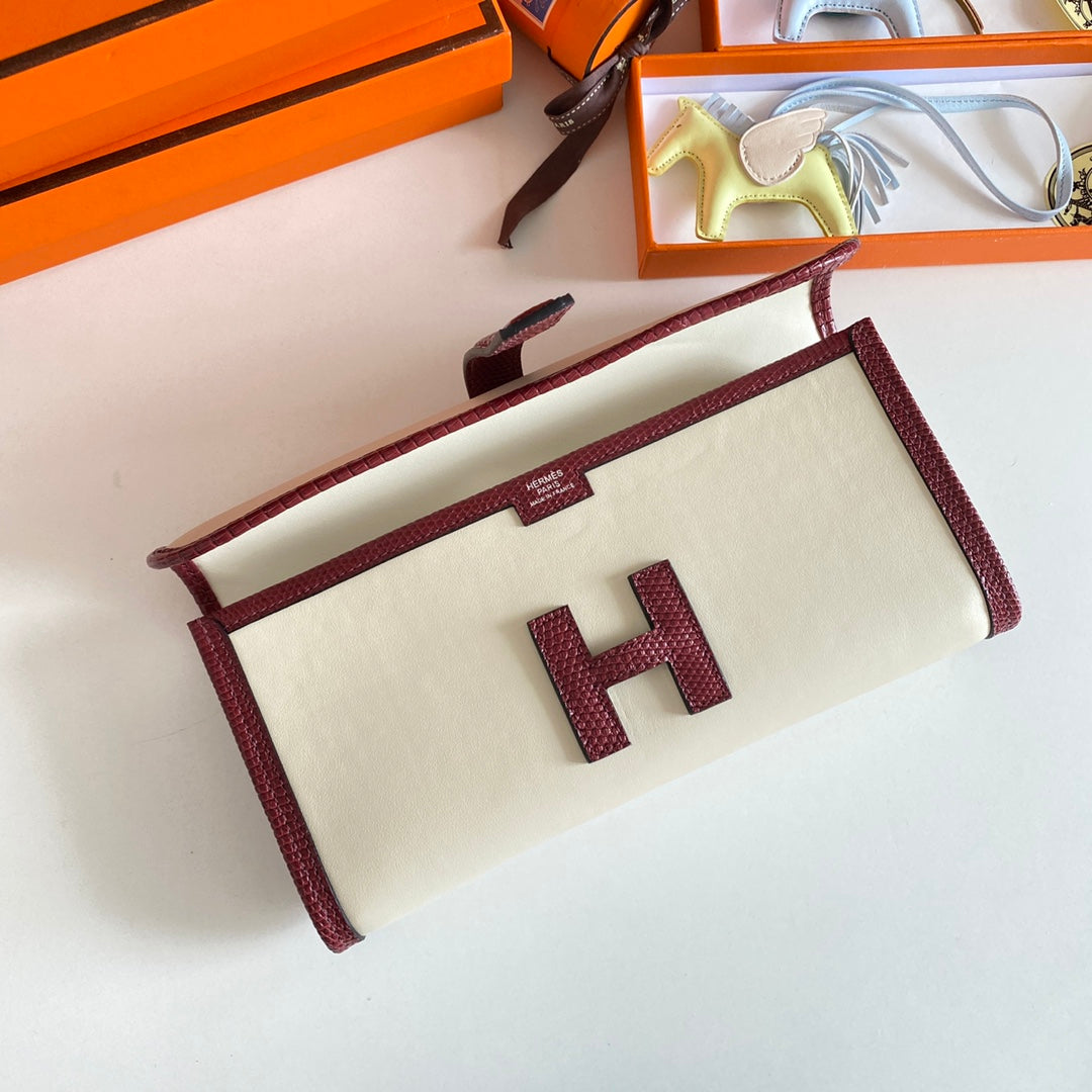 JIGE ELAN 29 CLUTCH IN WHITE CALFSKIN WITH GARNET RED LIZARD SKIN
