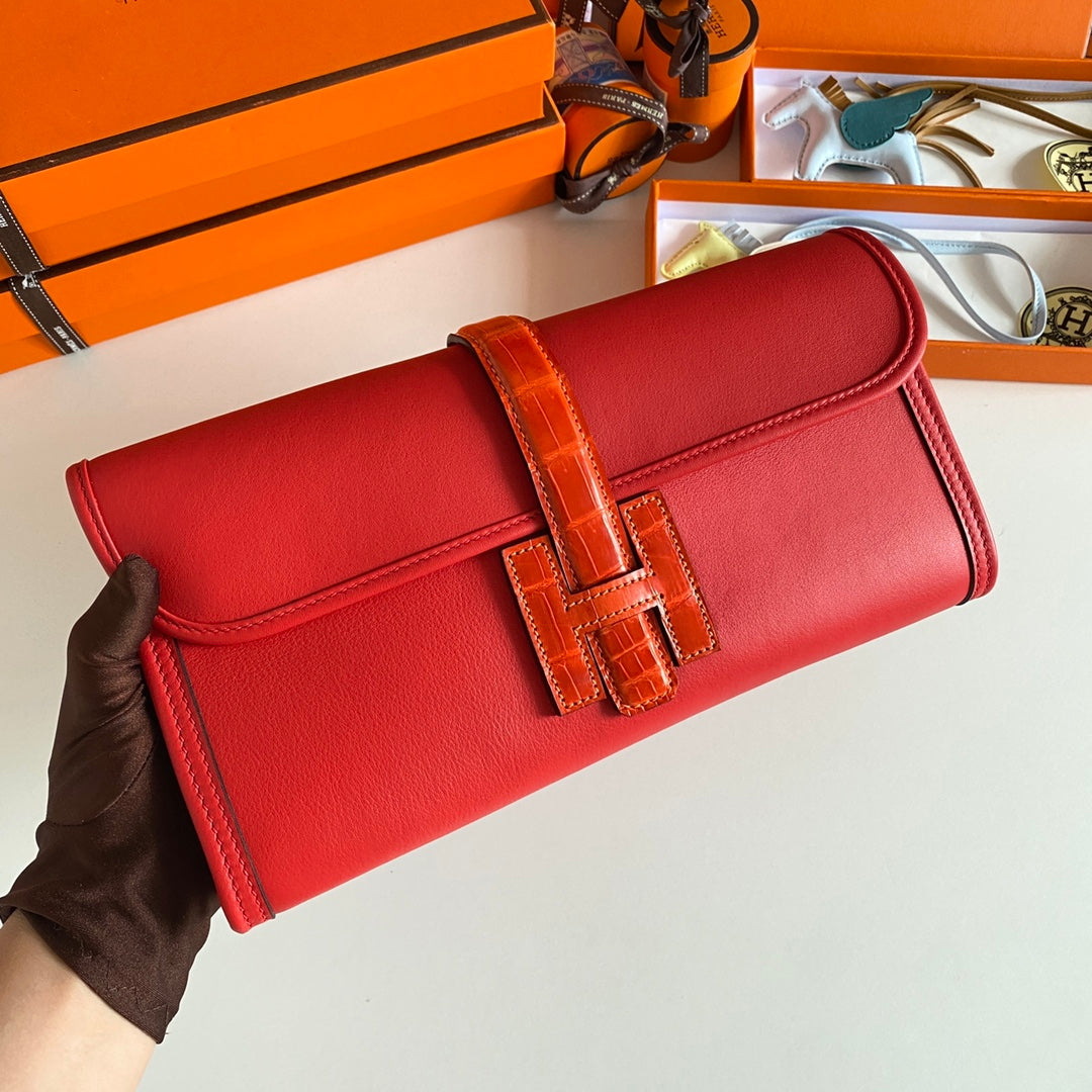 JIGE ELAN 29 CLUTCH IN RUBY RED CALFSKIN WITH APPLE RED LIZARD SKIN