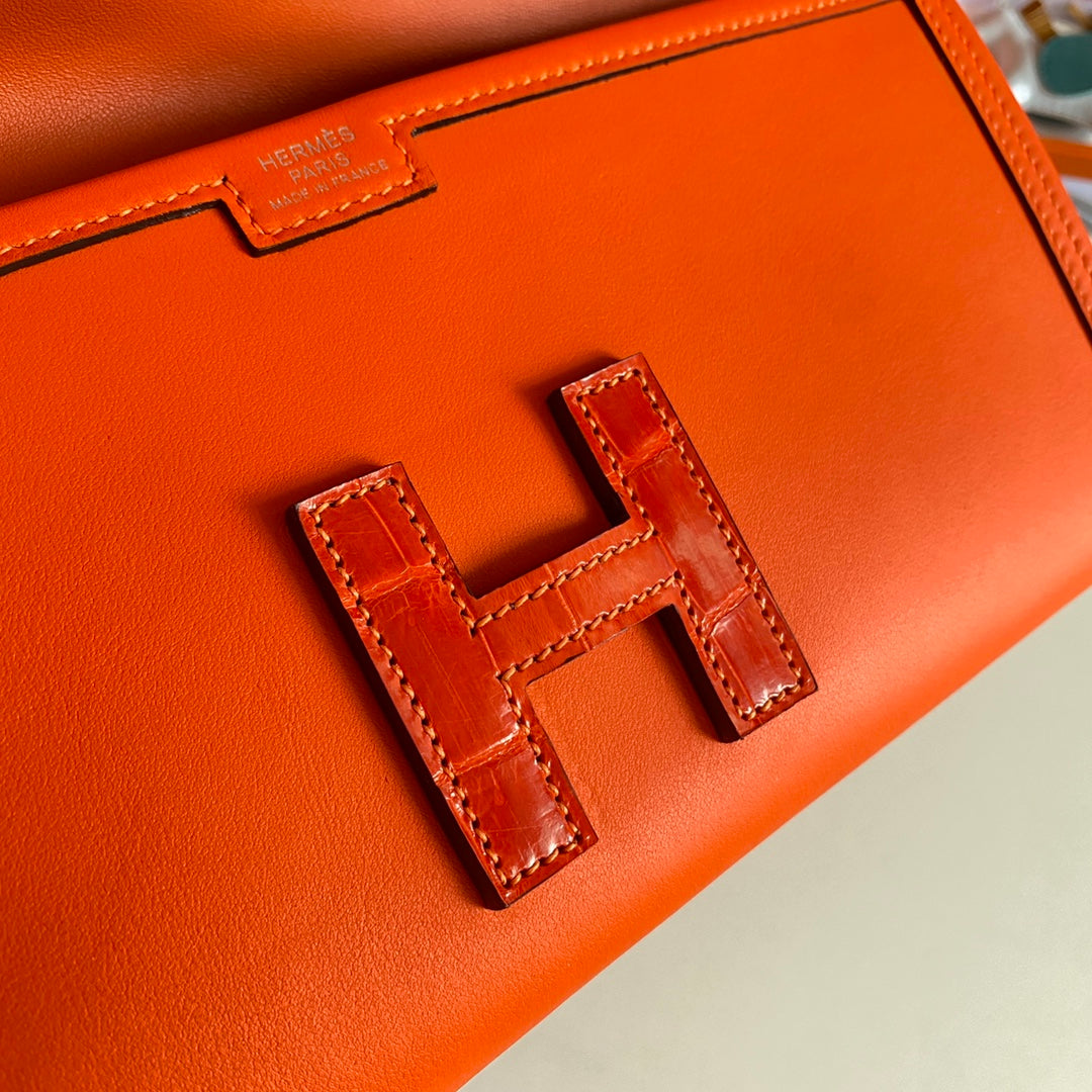 JIGE ELAN 29 CLUTCH IN BRIGHT ORANGE CALFSKIN WITH LIZARD SKIN