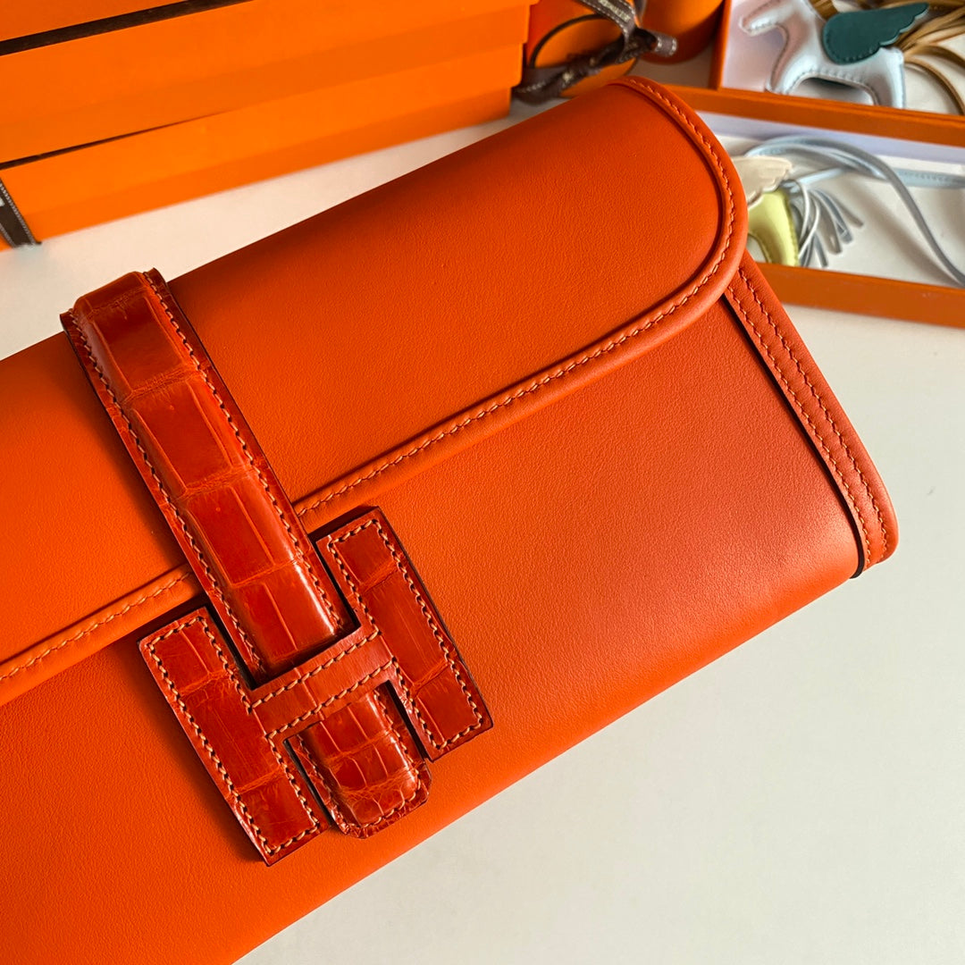 JIGE ELAN 29 CLUTCH IN BRIGHT ORANGE CALFSKIN WITH LIZARD SKIN