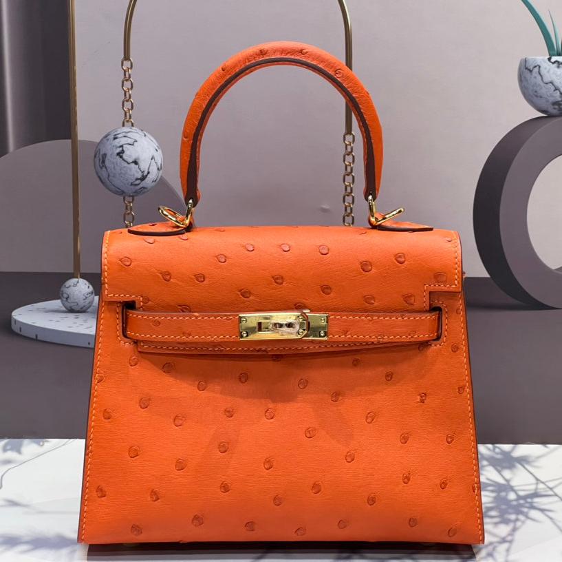 KELLY BAG 20 IN FIRE ORANGE OSTRICH LEATHER WITH GOLD HARDWARE