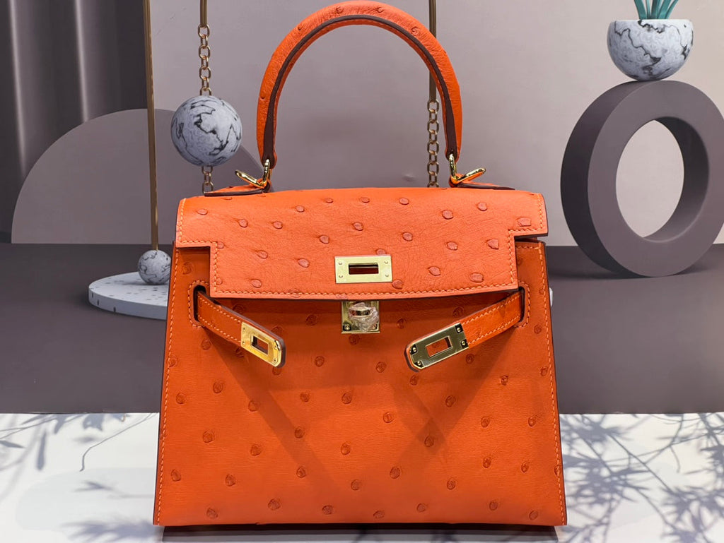 KELLY BAG 20 IN FIRE ORANGE OSTRICH LEATHER WITH GOLD HARDWARE