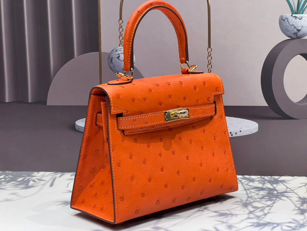 KELLY BAG 20 IN FIRE ORANGE OSTRICH LEATHER WITH GOLD HARDWARE