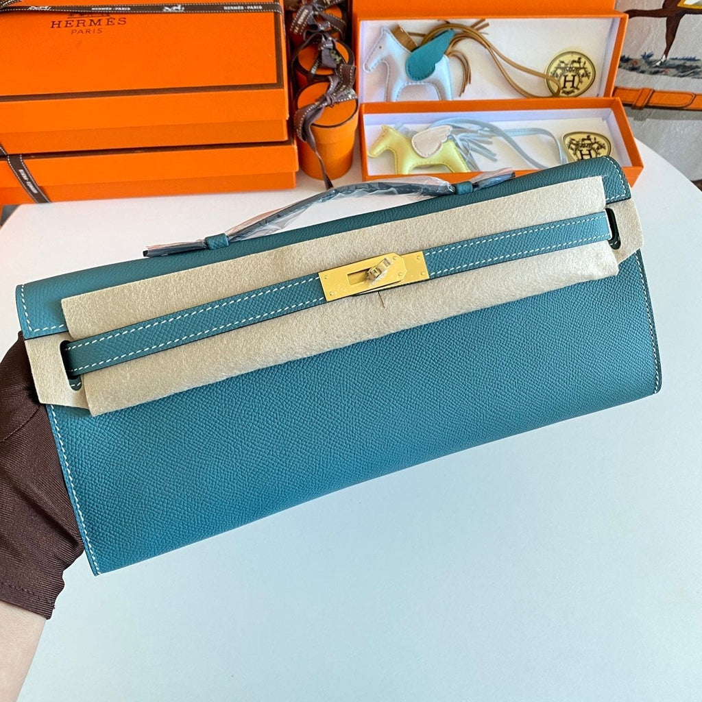 KELLY CUT 31 IN AZURE BLUE CALFSKIN WITH GOLD HARDWARE