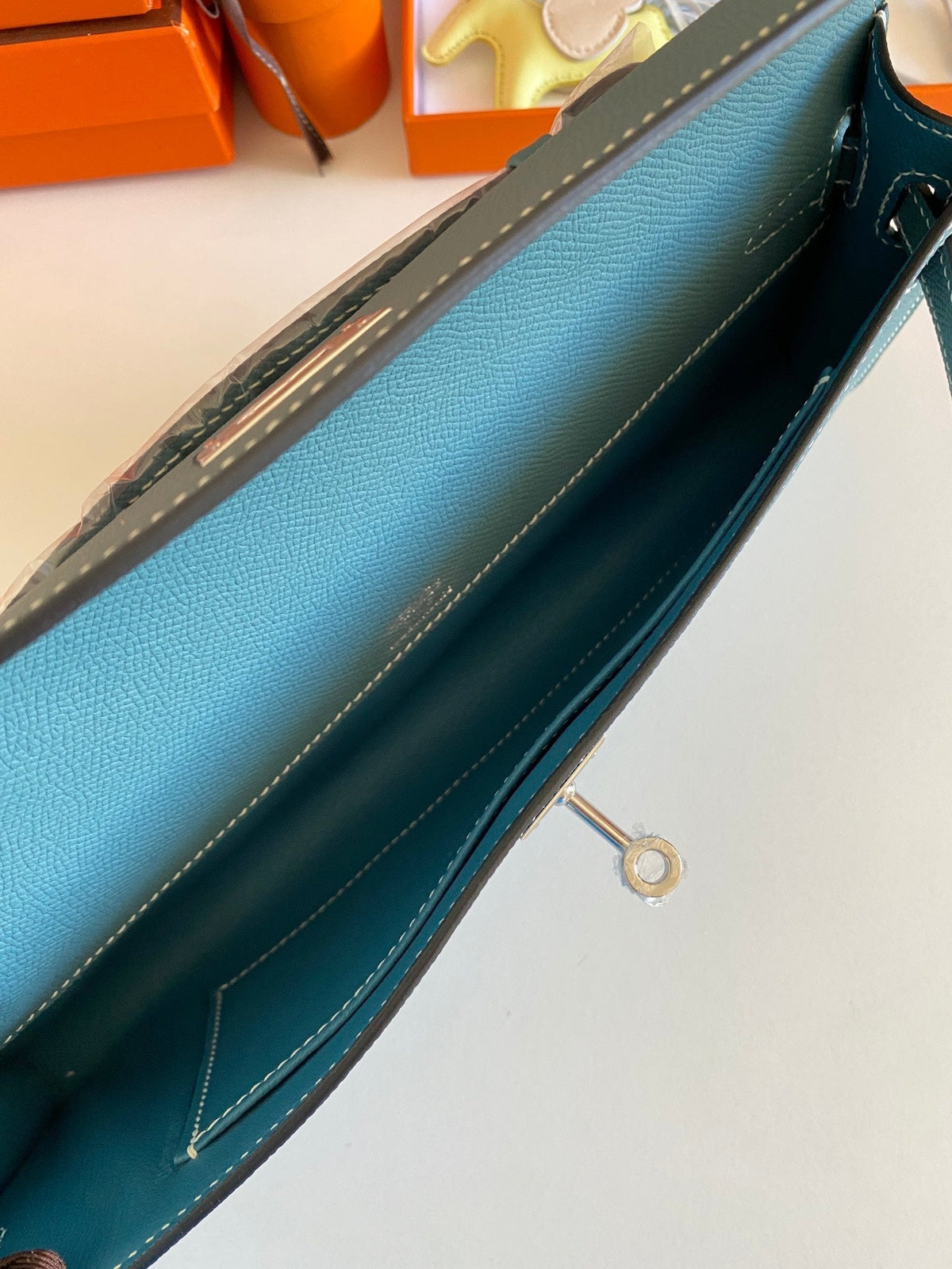 KELLY CUT 31 IN AZURE BLUE CALFSKIN WITH SILVER HARDWARE