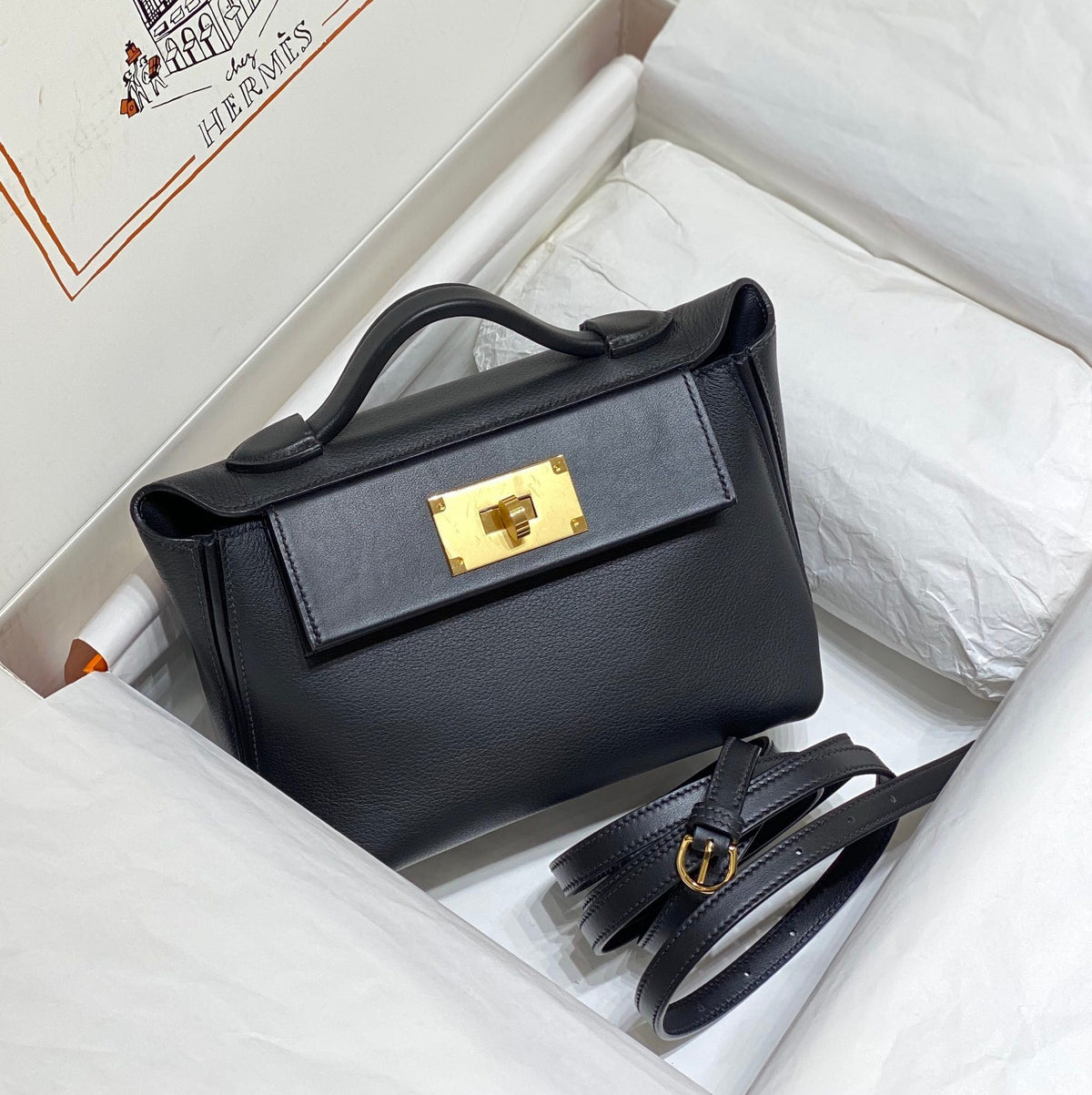 MINI 24/24 21CM IN BLACK EVERCOLOR CALFSKIN GOLD KELLY BUCKLE
