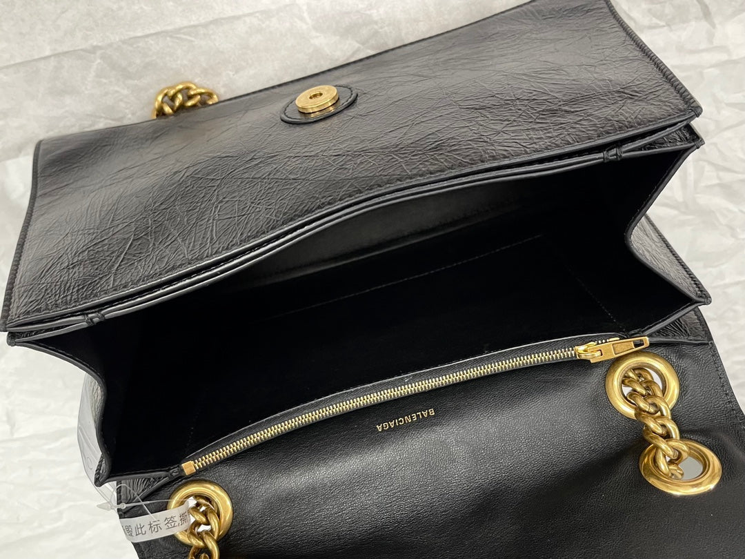 CRUSH MEDIUM CHAIN BAG 31 IN BLACK CRUSHED CALFSKIN GOLD HARDWARE