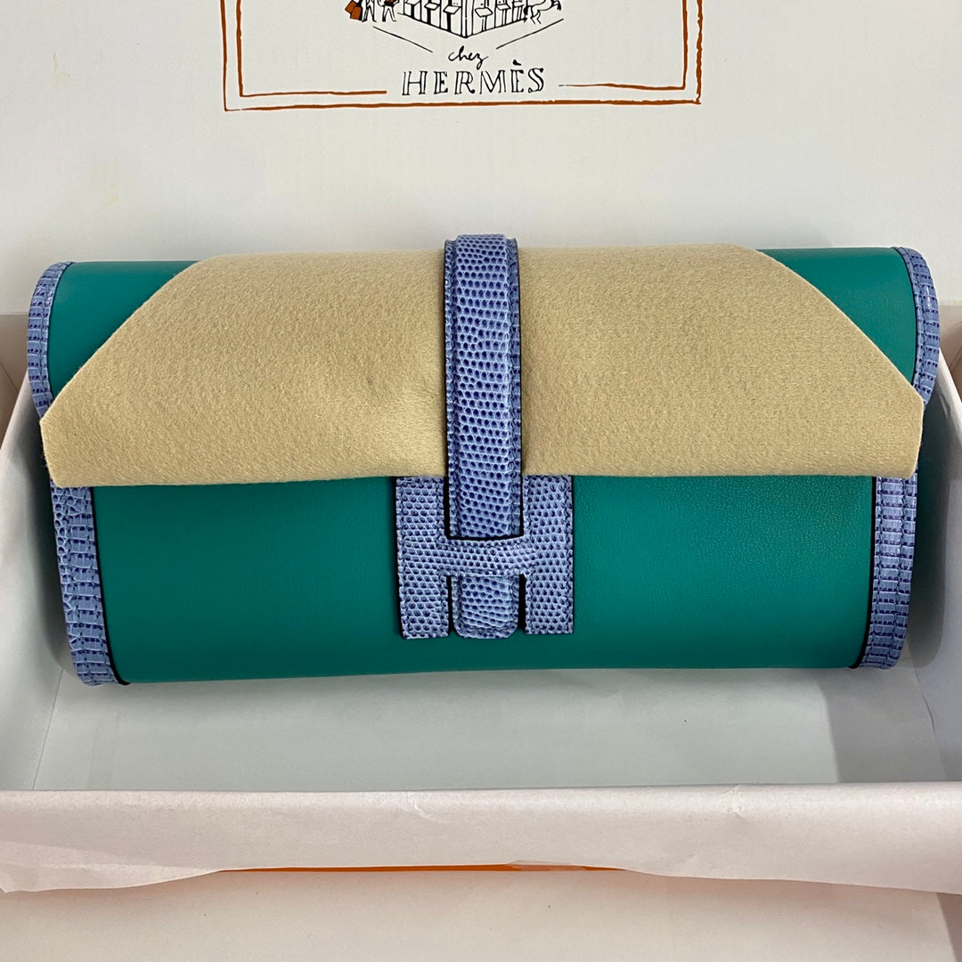JIGE ELAN 29 CLUTCH IN TEAL GREEN CALFSKIN WITH ROYAL BLUE LIZARD SKIN