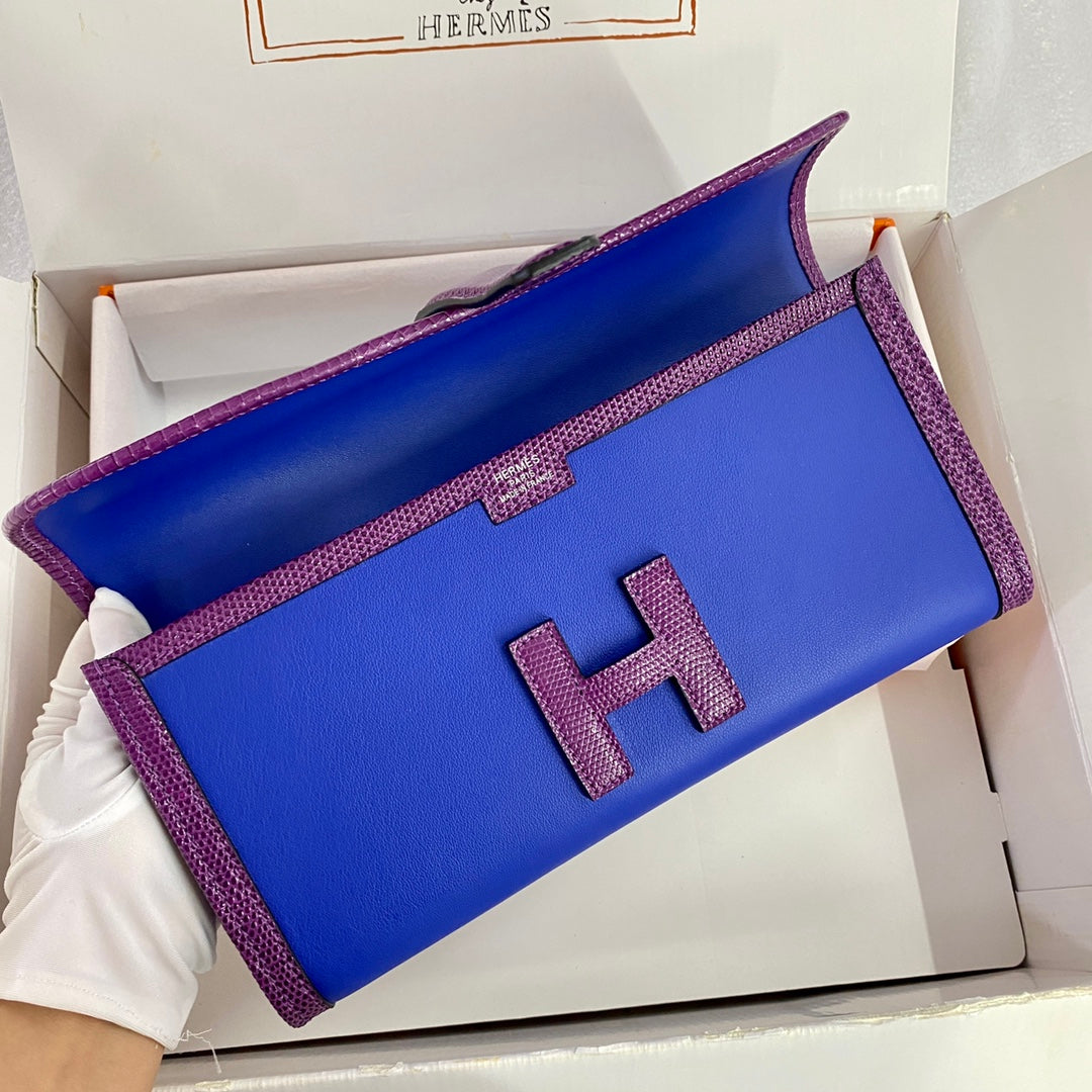 JIGE ELAN 29 CLUTCH IN COBALT BLUE CALFSKIN WITH VIOLET PURPLE LIZARD SKIN