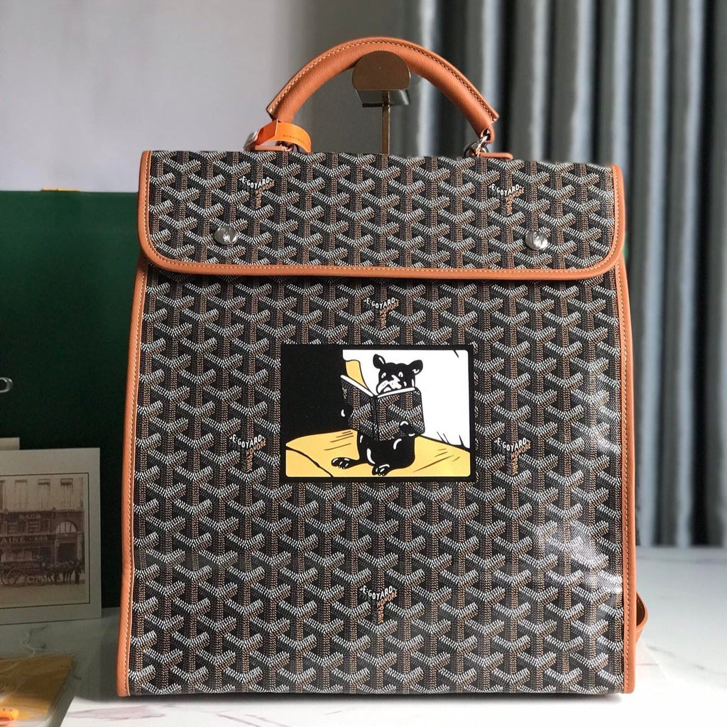 SAINT LÉGER BACKPACK 35 IN BROWN GOYARDINE CANVAS AND CALFSKIN WITH CARTOON PATCH