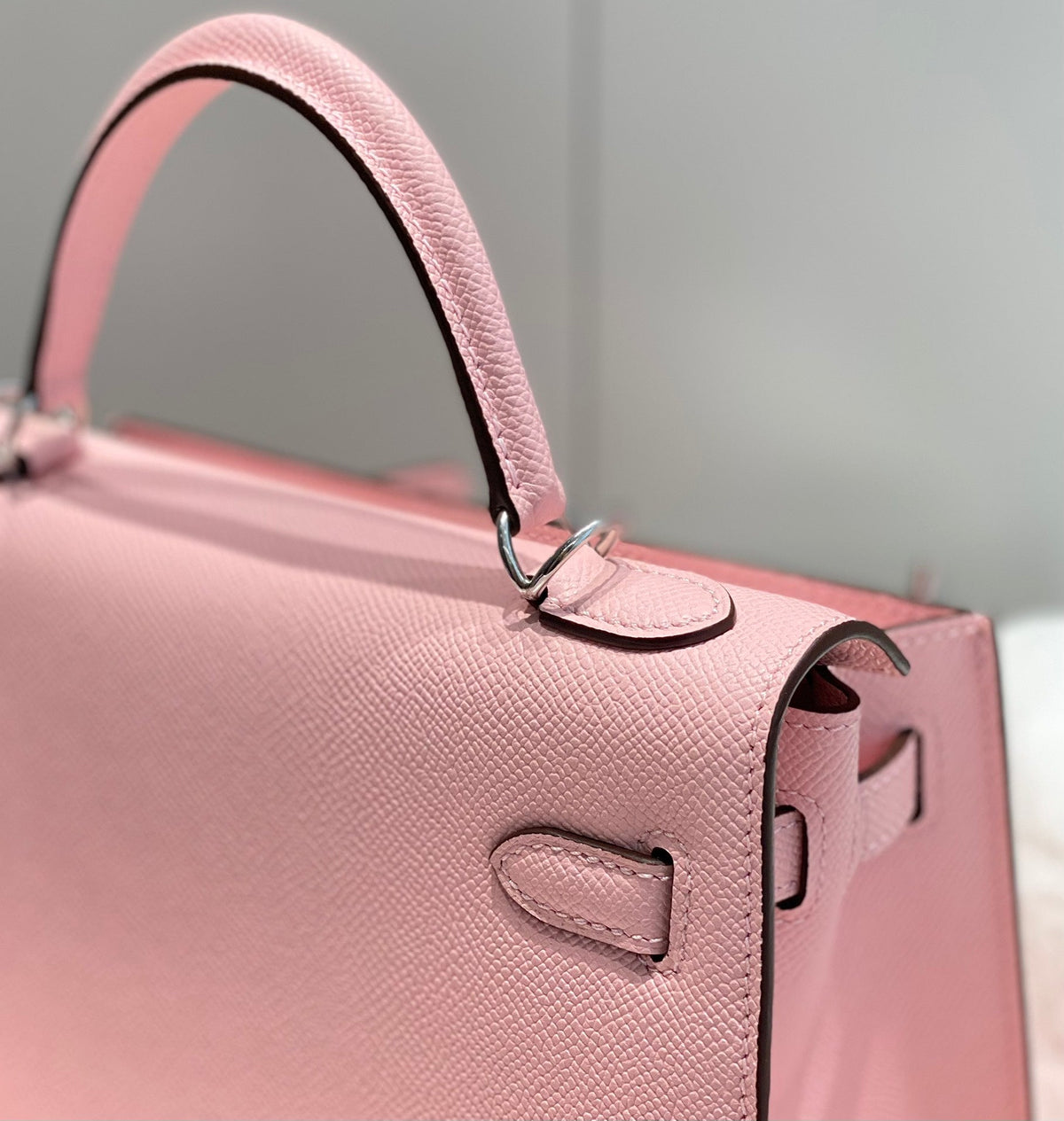 KELLY 25CM IN ROSE SAKURA SWIFT CALFSKIN SILVER HARDWARE