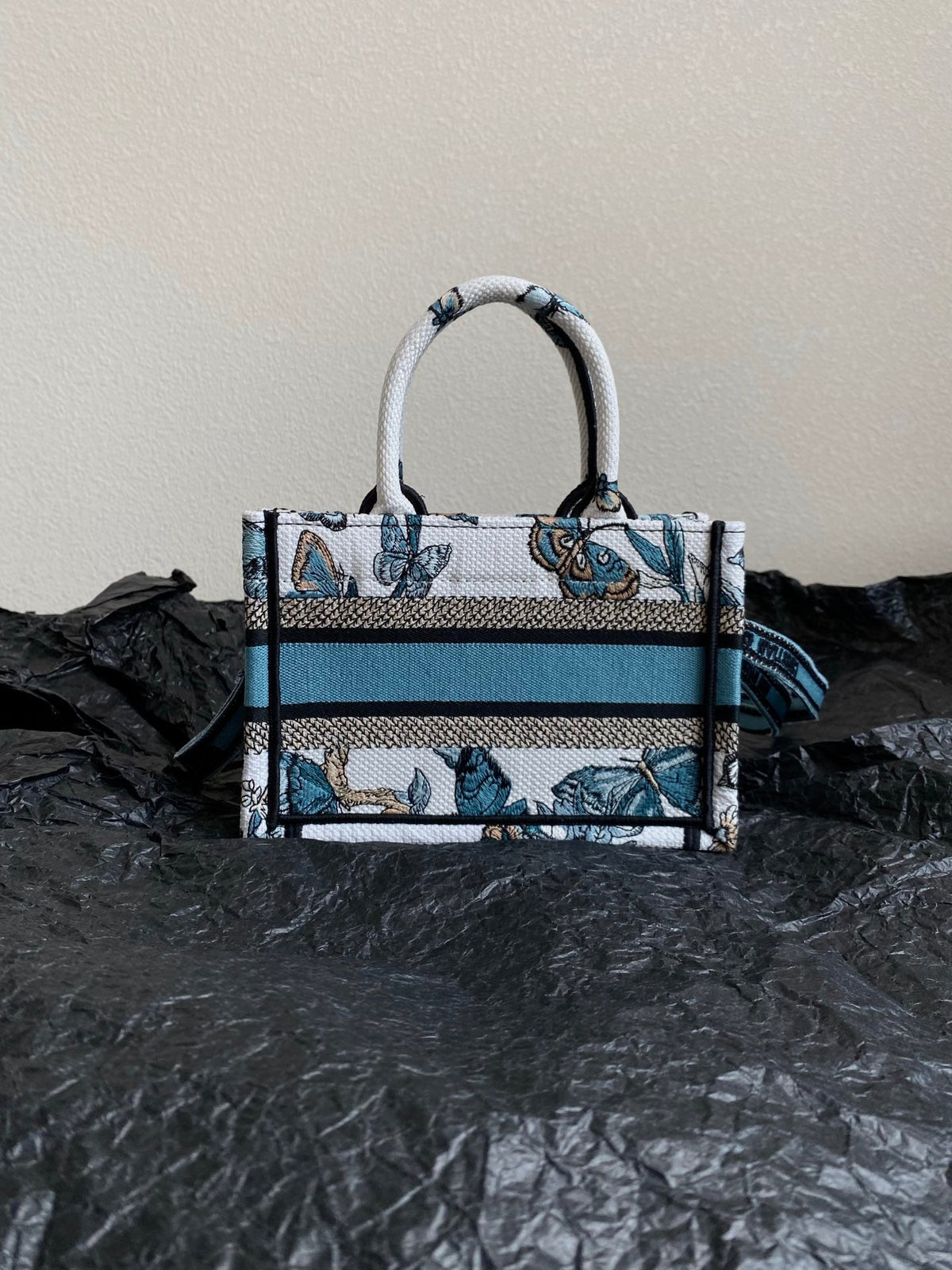 MINI BOOK TOTE 21 BUTTERFLY PATTERN BLUE CALFSKIN