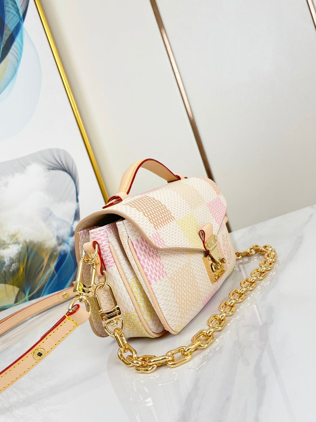 POCHETTE MÉTIS EAST WEST 21 IN PEACH DAMIER GIANT CANVAS GOLD HARDWARE