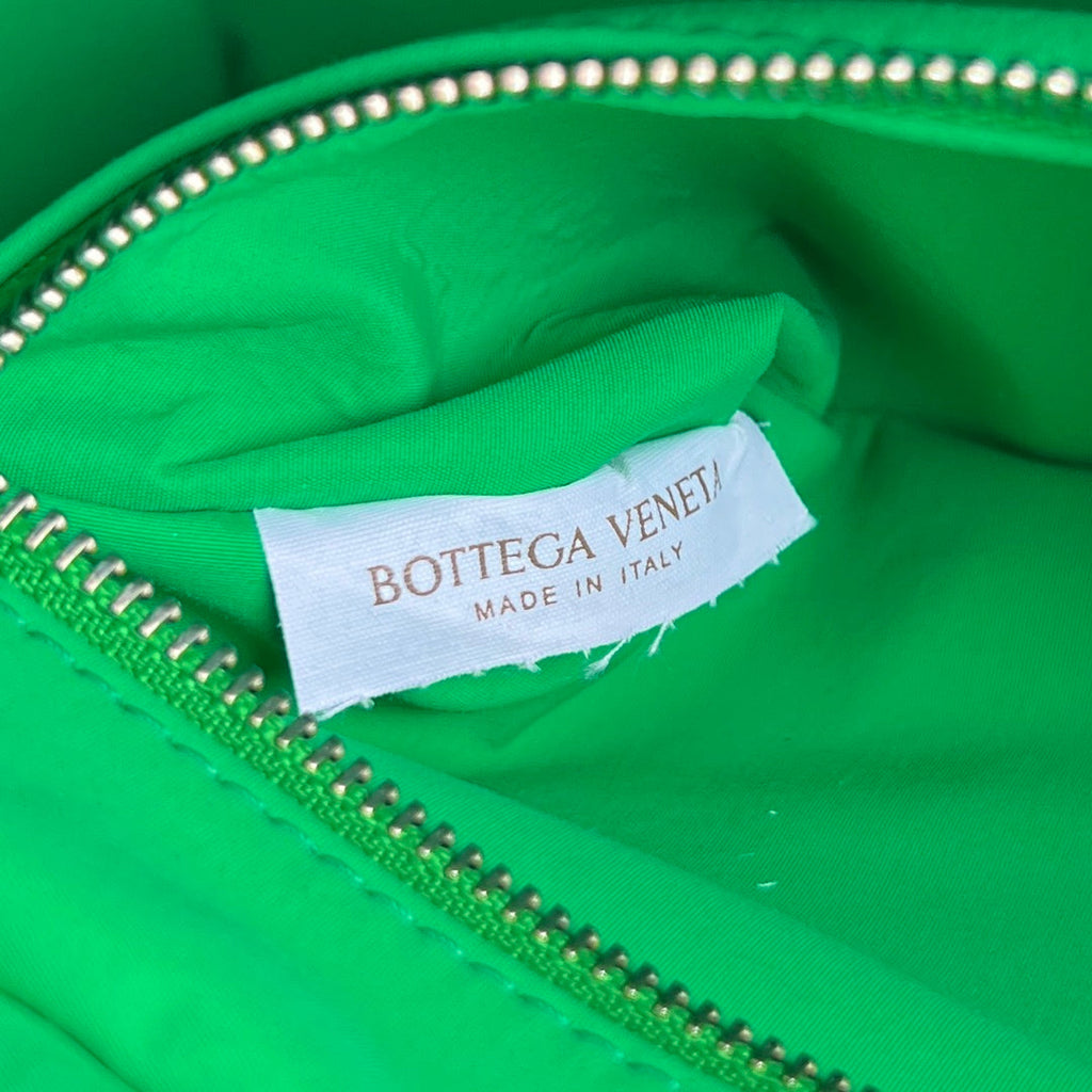 INTRECCIATO CLUTCH 26 IN MALACHITE GREEN CALFSKIN
