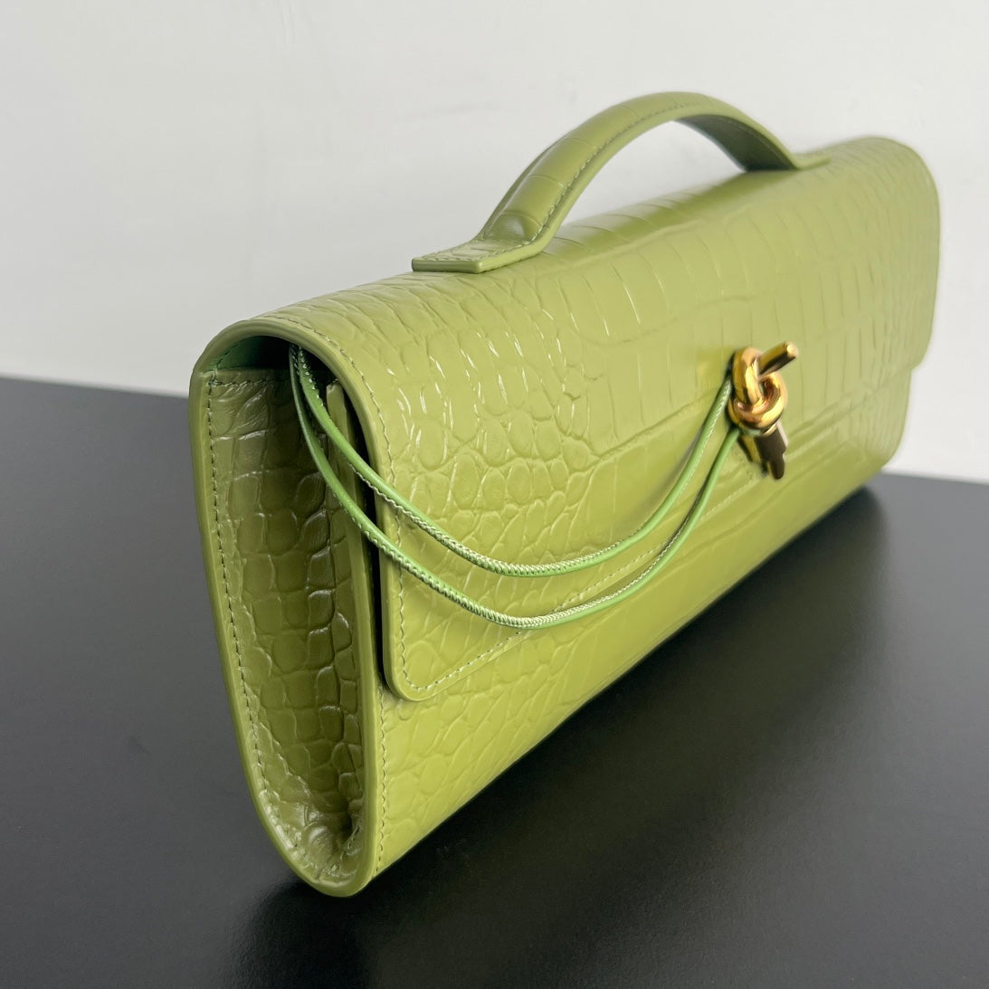 ANDIAMO CLUTCH 31 IN BARLEY CORN CROCODILE PATTERN CALFSKIN