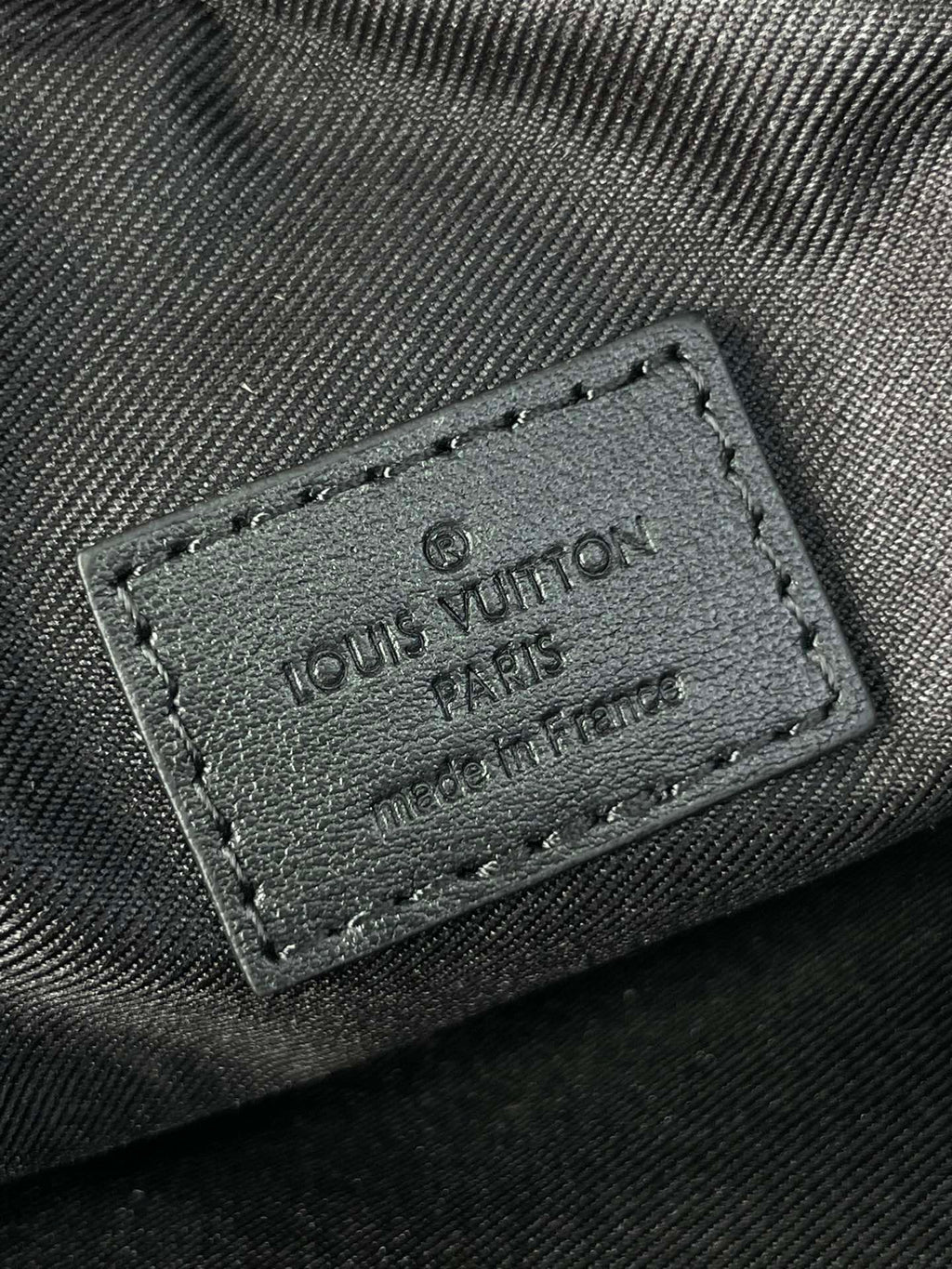 GETAWAY MESSENGER 18 IN GUN METAL MONOGRAM ECLIPSE CANVAS