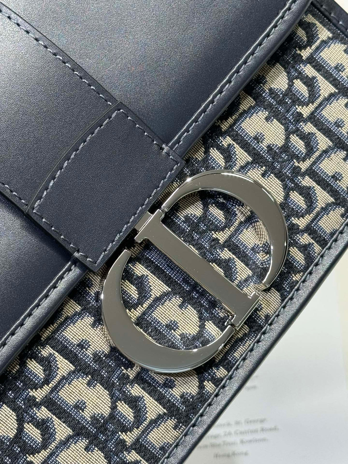MONTAIGNE EAST-WEST BAG 24 IN BLACK LAMBSKIN AND MONOGRAM OBLIQUE JACQUARD