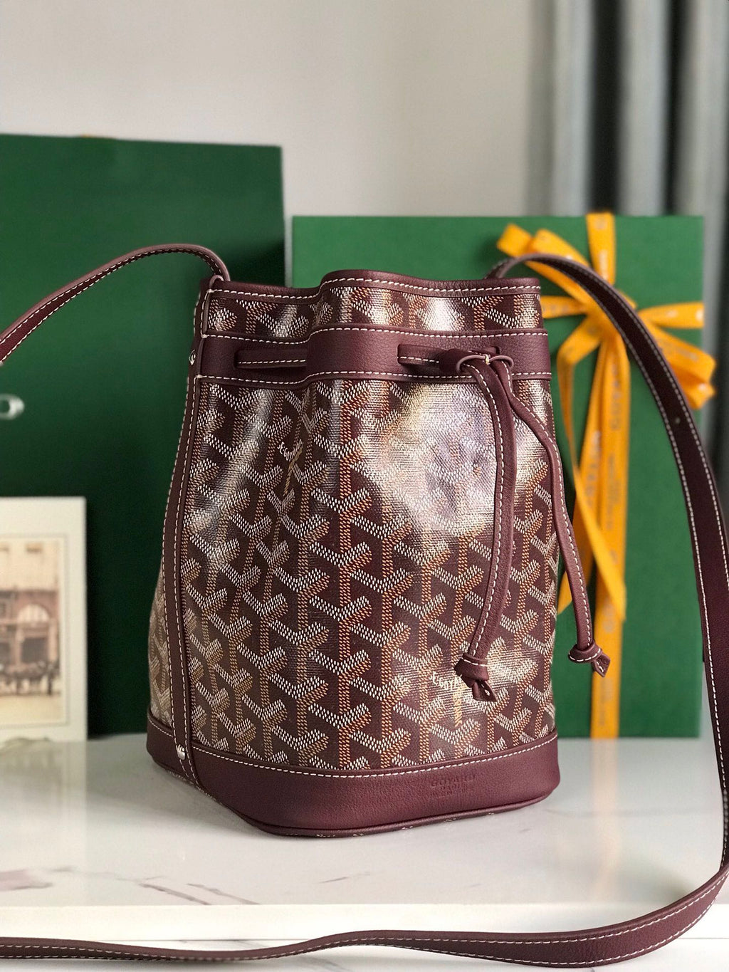 PETIT FLOT BUCKET BAG 22 IN WINE RED GOYARDINE CANVAS AND LAMBSKIN TRIM