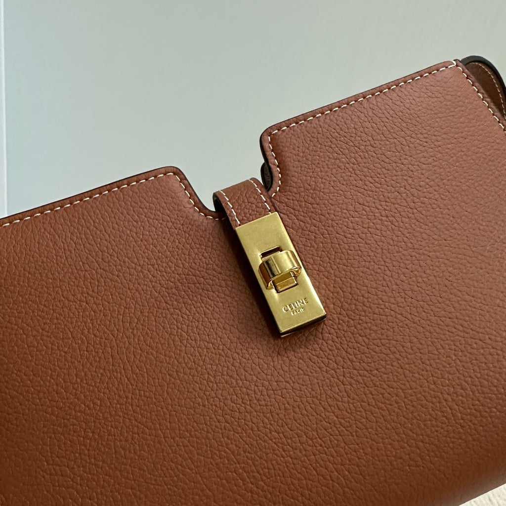 16 STRAP POCHETTE 18 IN BRONZE ORANGE SUPPLE CALFSKIN GOLD HARDWARE