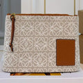 LOE 28 CLUTCH BAG IN BEIGE ANAGRAM JACQUARD