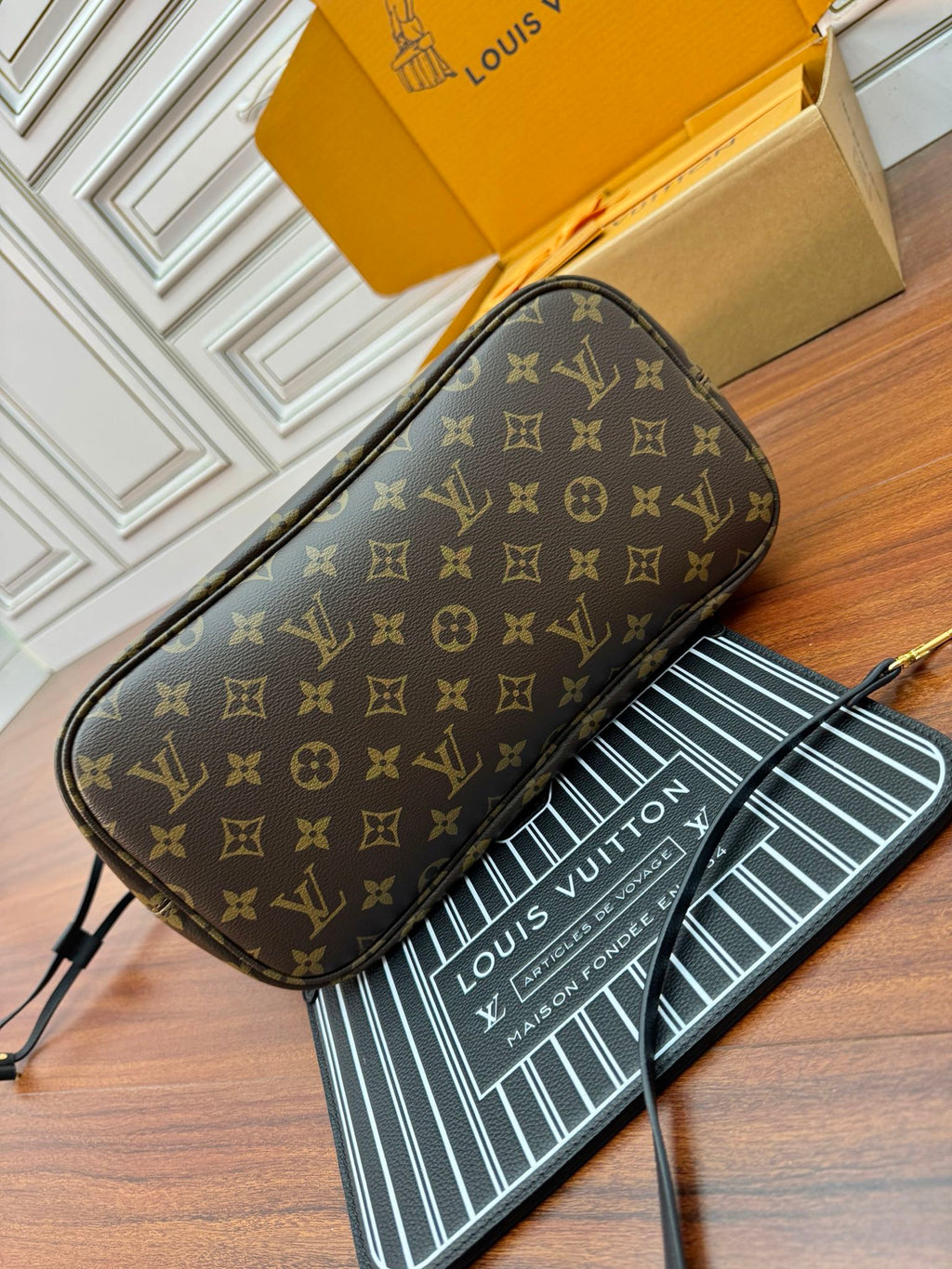 NEVERFULL INSIDE OUT MM BAG 31 IN BROWN MONOGRAM COATED CANVAS AND CALFSKIN