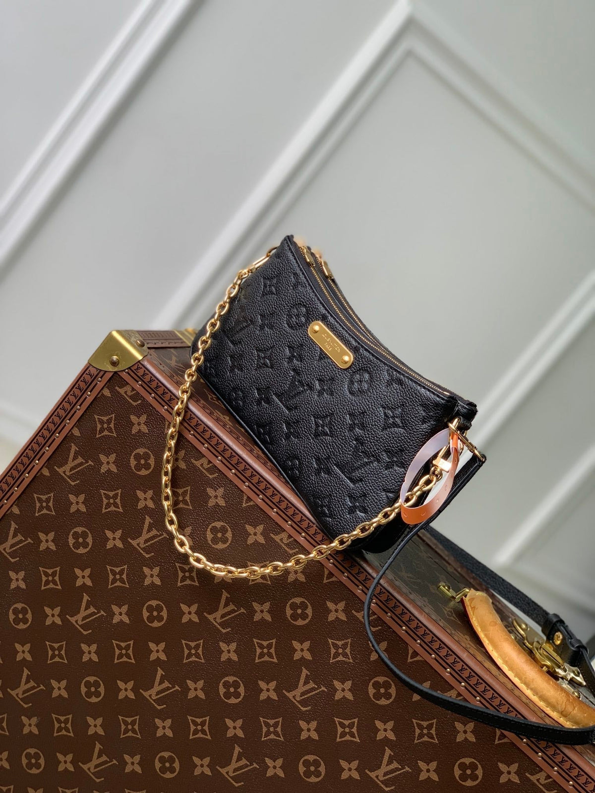 LIV POCHETTE BAG 24 IN BLACK MONOGRAM EMPREINTE LEATHER