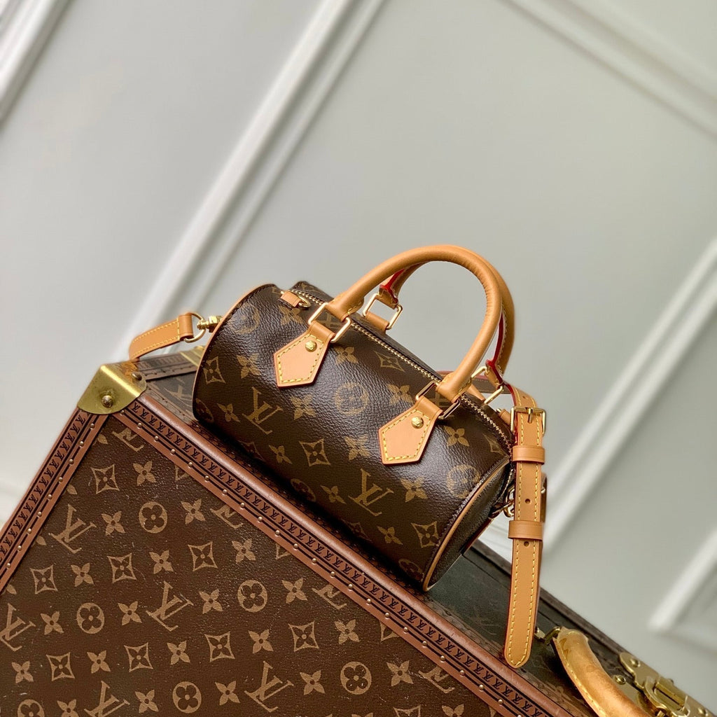 NANO SPEEDY DATING 18 IN BROWN COATED CANVAS GOLD HARDWARE