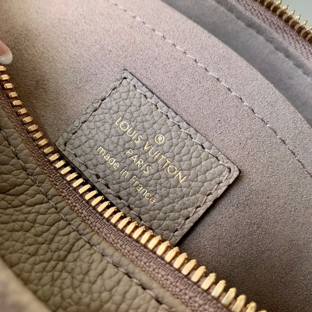 ONTHEGO EAST WEST BAG 25 IN GREEN MONOGRAM EMBOSSED COWHIDE