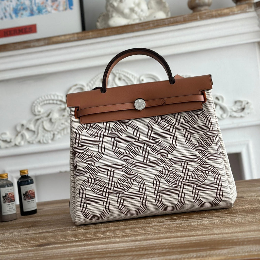 HERBAG ZIP 31 LAQUERED BAG IN OFF-WHITE MIX BROWN H PLUME CANVAS AND BROWN COWHIDE