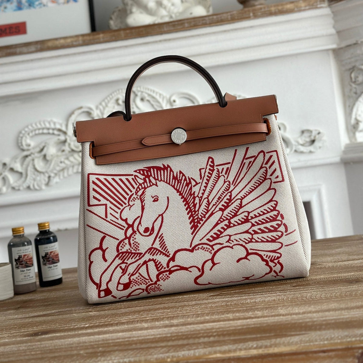 HERBAG ZIP 31 RETOURNE PEGASE POP BAG IN OFF-WHITE MIX RED CANVAS AND HUNTER COWHIDE