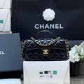 QUILTED FLAP BAG WITH HANDLE 20 IN BLACK LAMBSKIN GOLD PLATED METAL